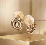 Bouchons d'oreilles QUIET Adapte dorés avec embouts en silicone, design ajustable pour une réduction du bruit optimale