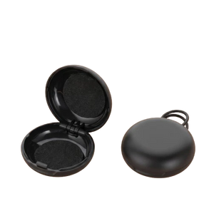 Étui de rangement rond noir QUIET pour bouchons d'oreilles en plastique durable avec design empilable