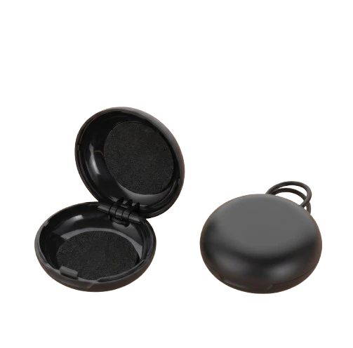 Étui de rangement rond noir QUIET pour bouchons d'oreilles en plastique durable avec design empilable